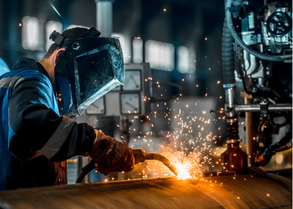 Welder fuses metal together